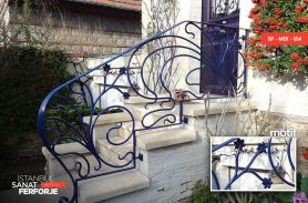 Wrought Iron Stair Railing with Blue Flower Motifs