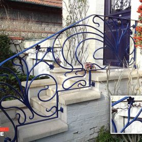 Wrought Iron Stair Railing with Blue Flower Motifs